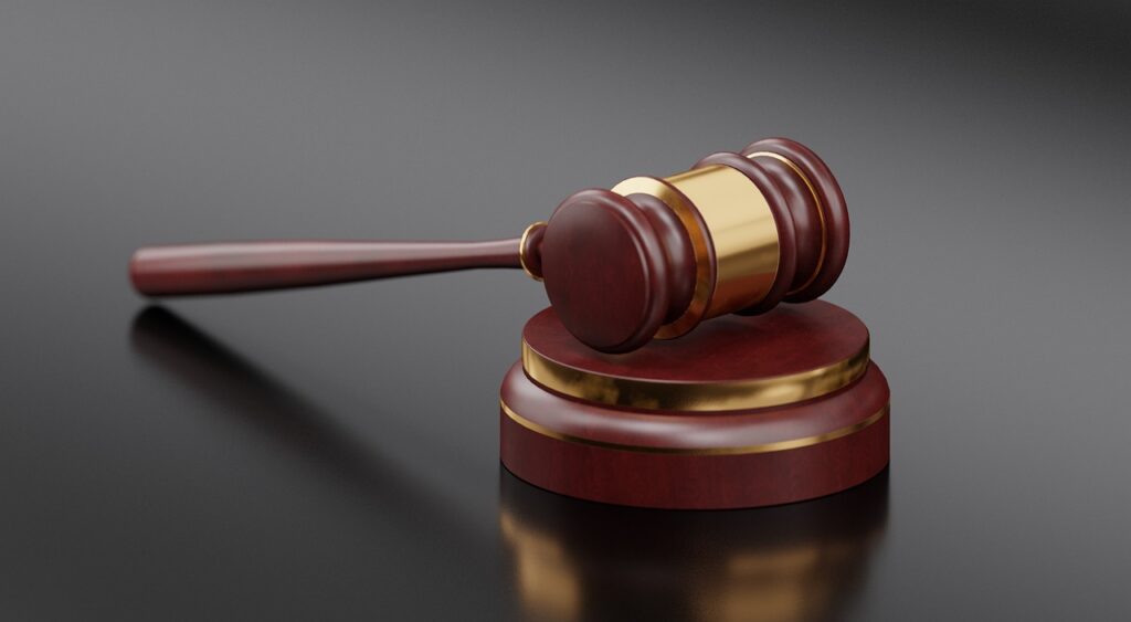 Legal reference books and gavel