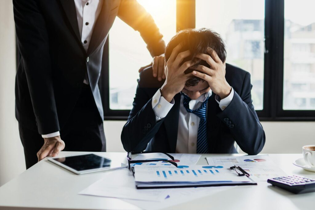 Business owner realizing reverse consolidation worsened stacked MCA debt situation