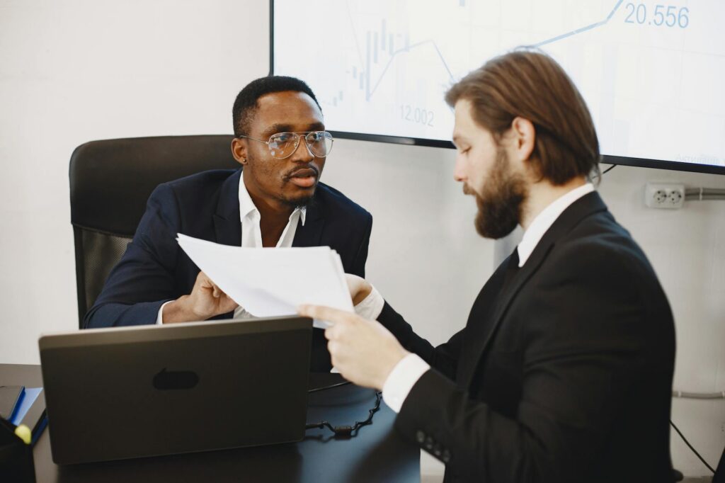Business owner consulting with an MCA relief specialist