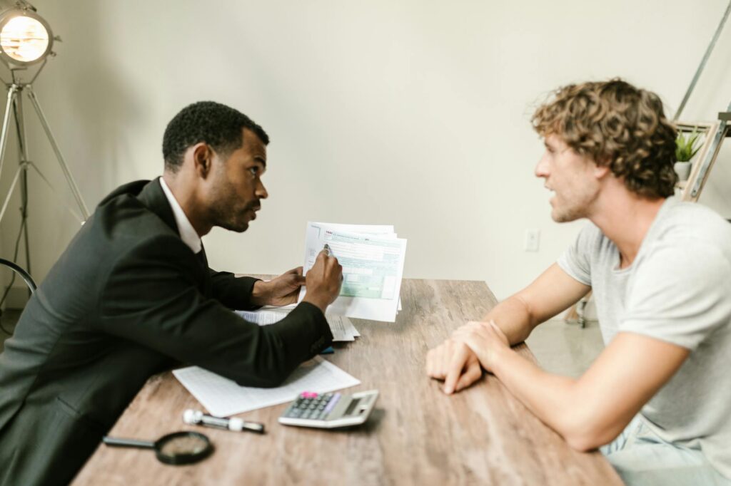 MCA Relief Specialist consulting with business owner on settlement strategy