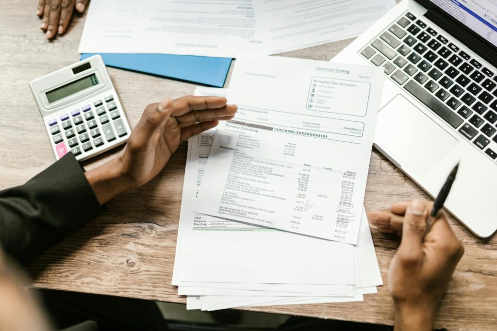 Business owner calculating true cost of MCA factor rate advance