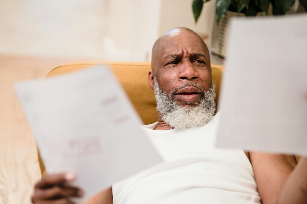 Restaurant owner calculating cash flow impact of multiple MCA daily debits during slow week