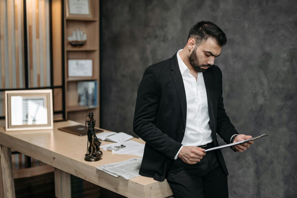 Business owner reviewing confession of judgment clause in MCA contract