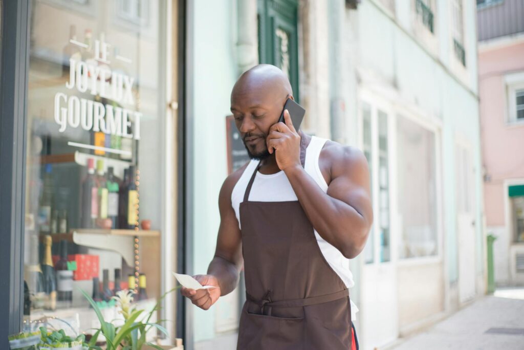 Business owner speaking with MCA relief specialist about debt restructuring options