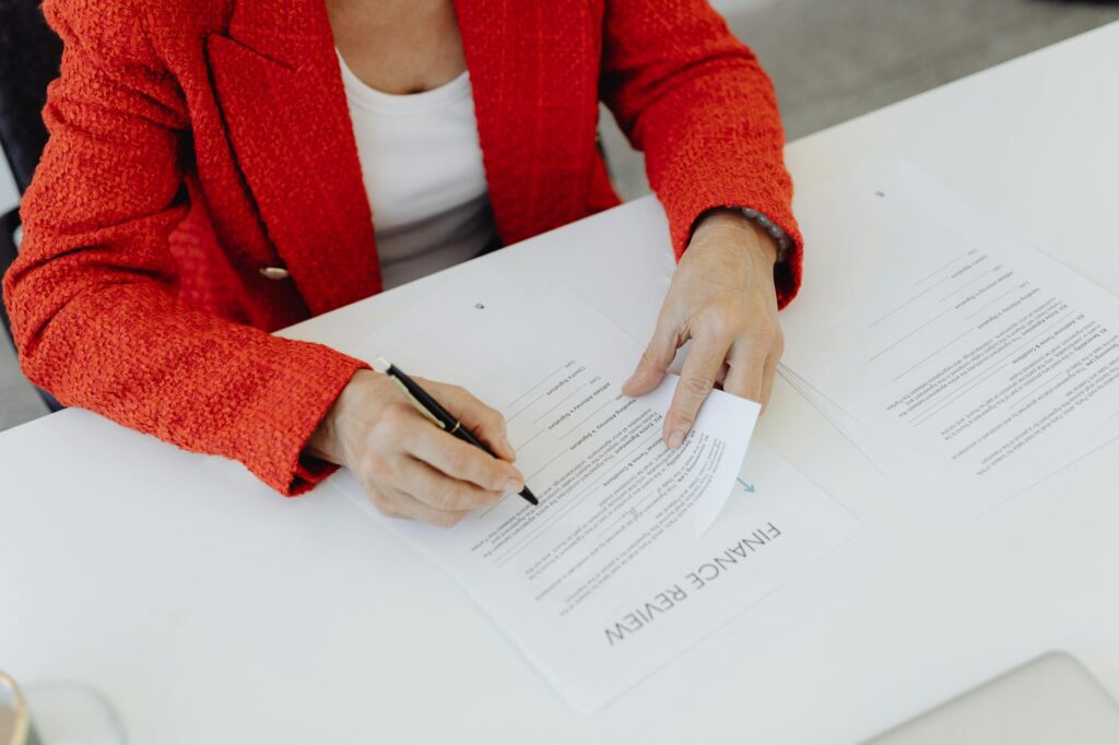 Business owner reviewing UCC-1 lien filings from MCA funders
