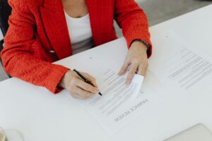 Business owner reviewing UCC-1 lien filings from MCA funders