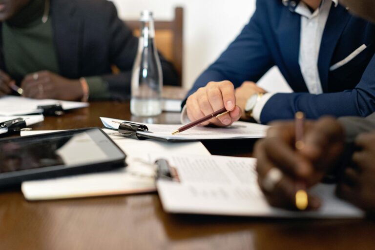 MCA debt settlement negotiation between business owner and funder representative