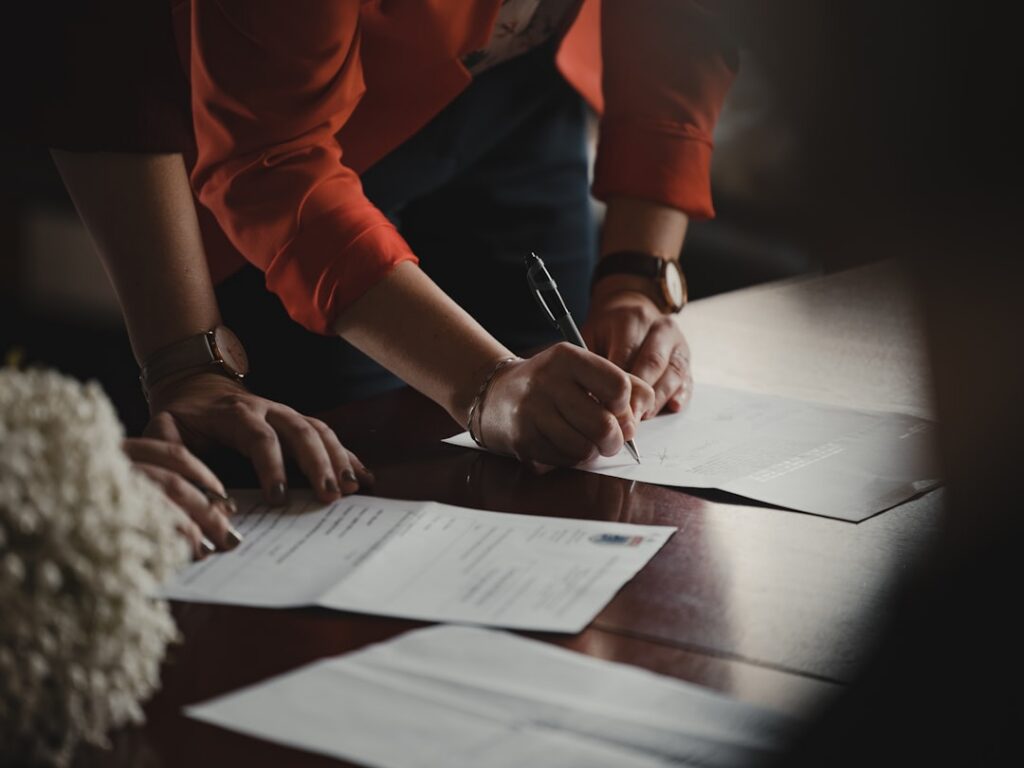 Attorney reviewing business legal documents related to an MCA dispute