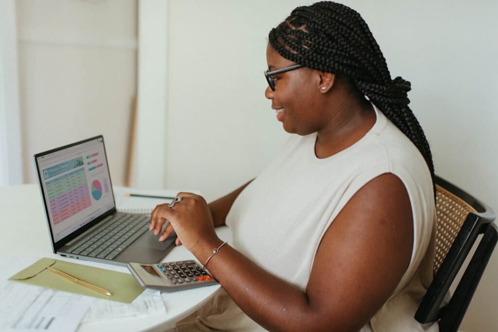 Business owner checking daily bank account debits and cash flow statement