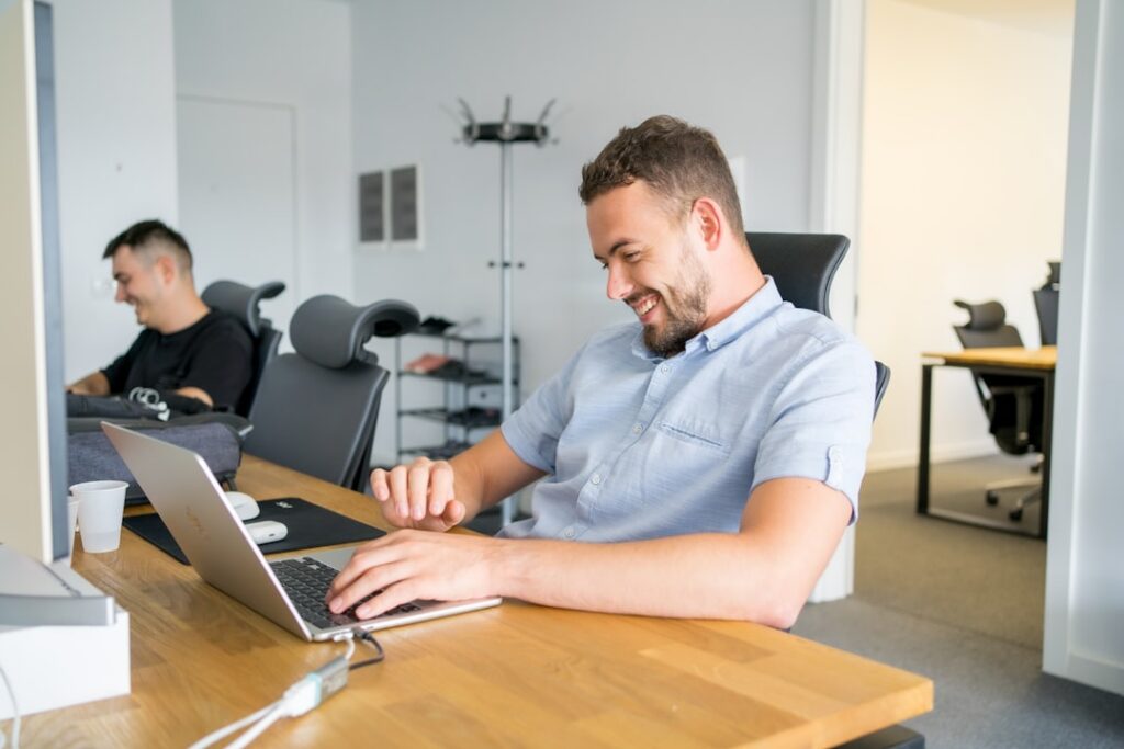 Business owner reviewing MCA workout documentation in office