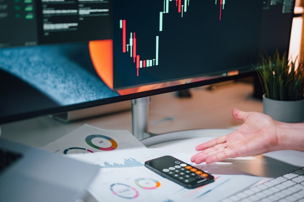 Accountant reviewing debt-service coverage ratio analysis charts
