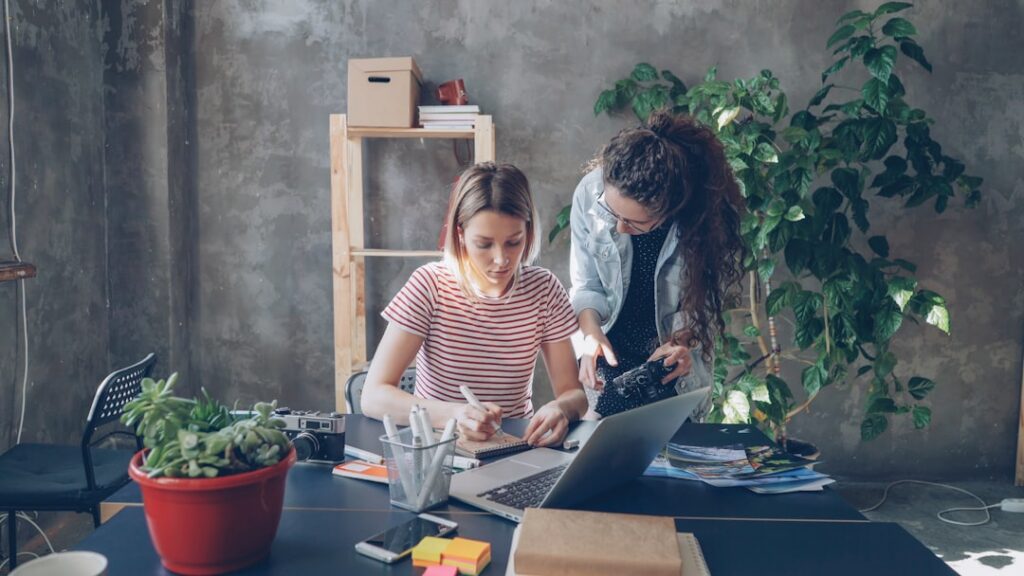 Small cleaning business owner reviewing financial restructuring paperwork at desk