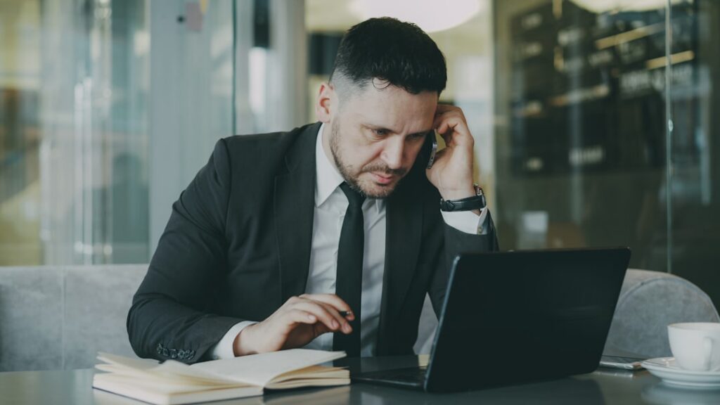 Trades business owner reviewing warning signs in financial statements