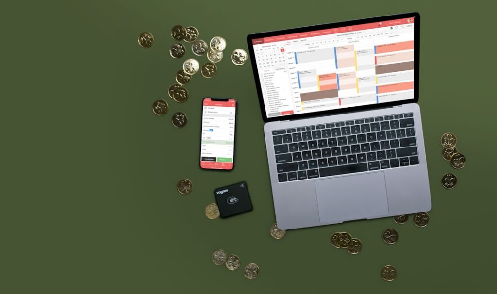 Financial spreadsheet showing MCA debt-service analysis on a laptop