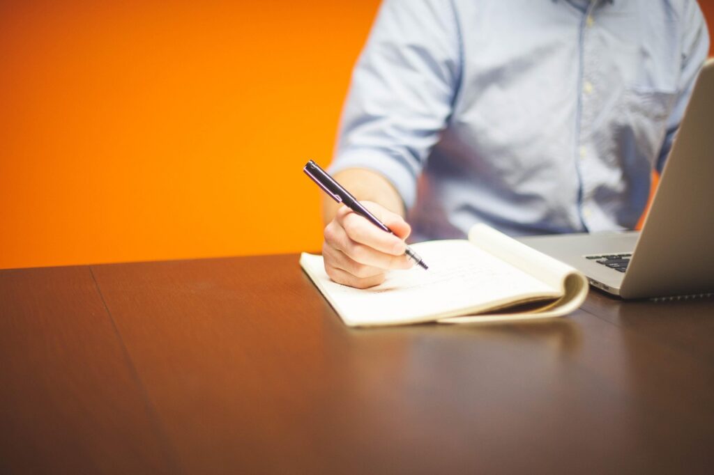 MCA debt negotiation meeting between business owner and financial specialist