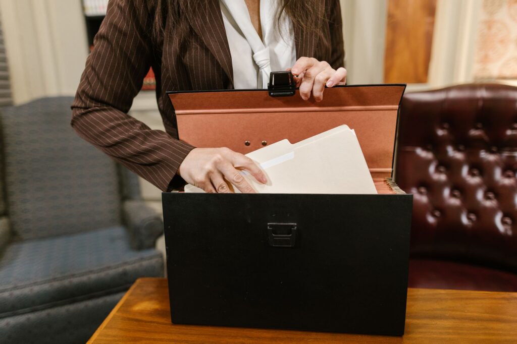 Filing cabinet with UCC lien documents in a small business office
