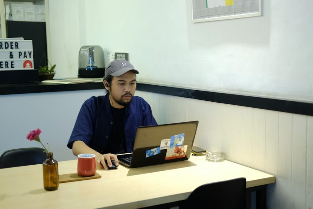 Business owner reviewing financial statements late at night in their shop