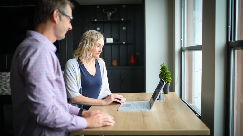 Business owner consulting with an MCA Options Specialist before listing their business for sale