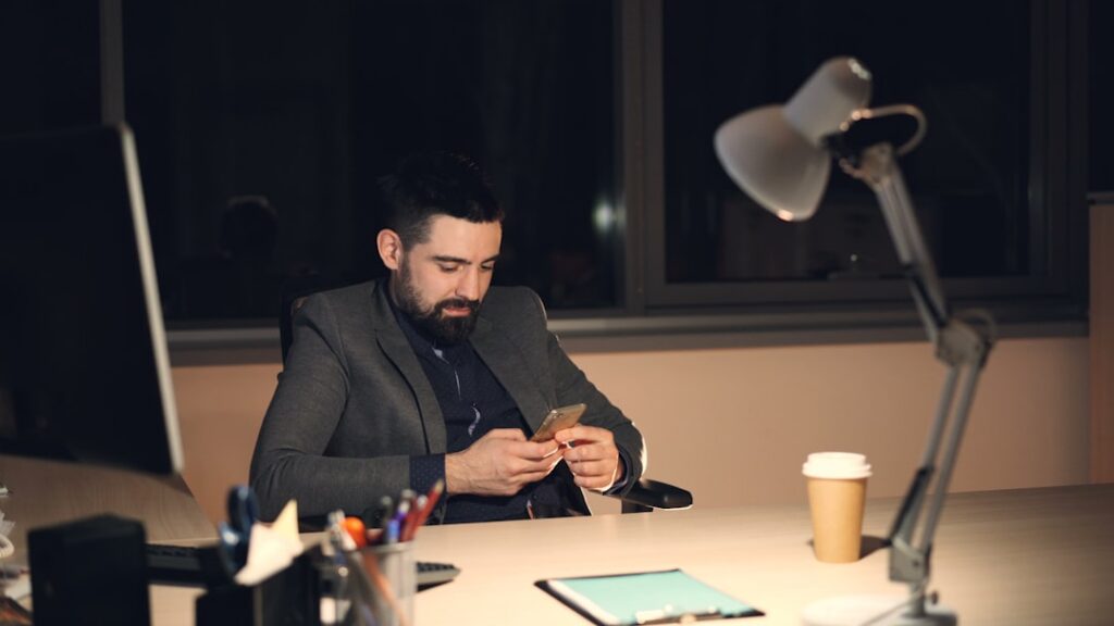 Business owner reviewing MCA documents at desk