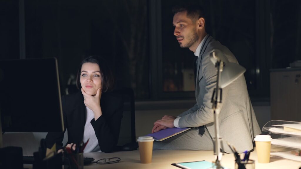 Small business owner reviewing MCA default notices at a desk