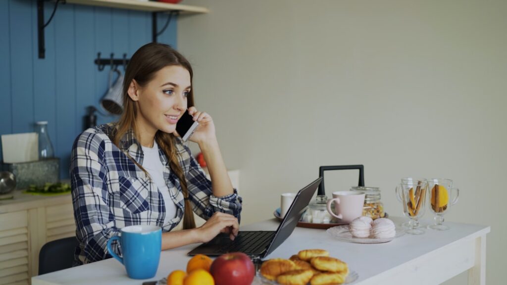 Business owner organizing bank statements and financial documents for MCA settlement