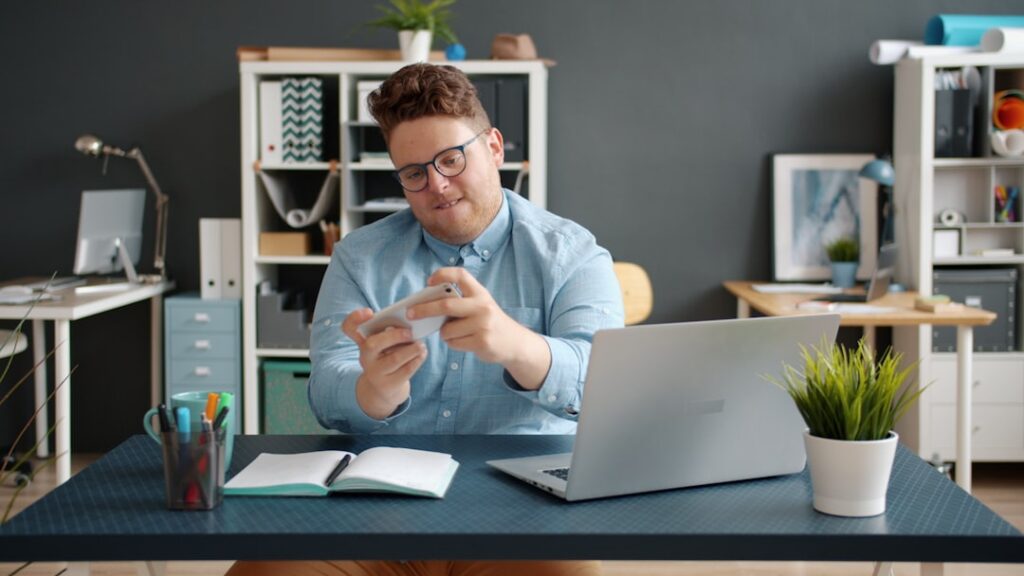 Small business owner reading MCA default notice at their desk