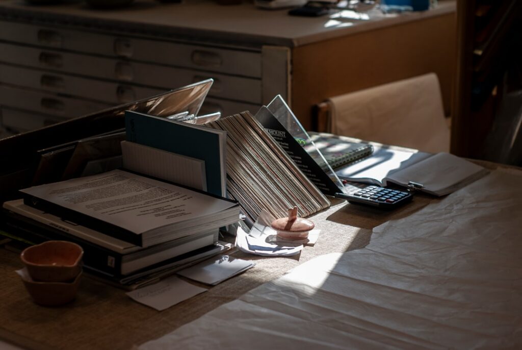 Legal UCC filing documents and folders organized on an office desk