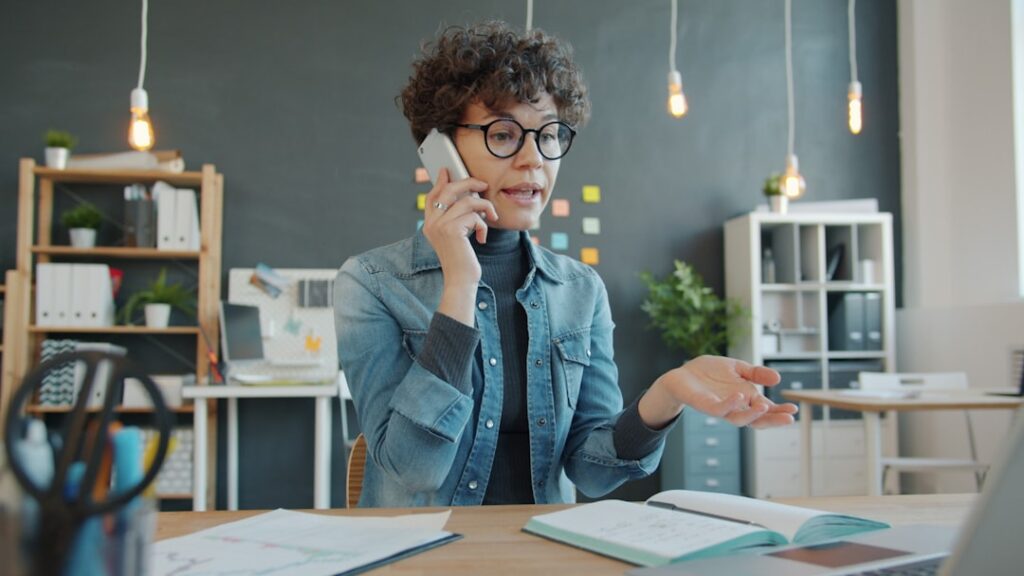 Small business owner consulting with MCA relief specialist about debt options