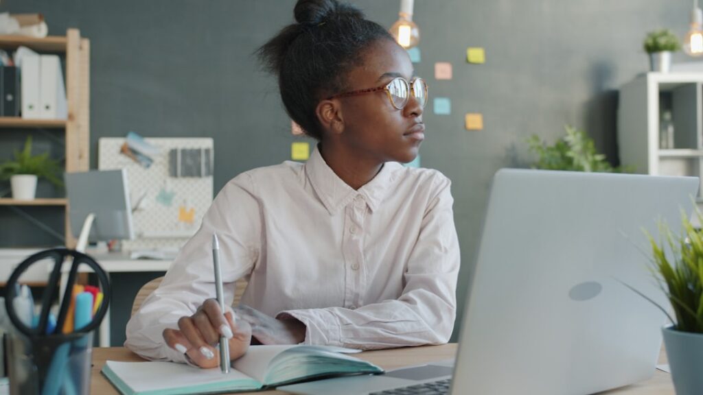 Business owner reviewing September estimated tax deadline alongside MCA payment schedule