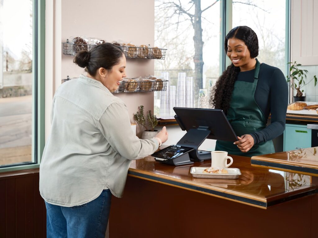 Business owner reviewing positive financials after resolving MCA debt