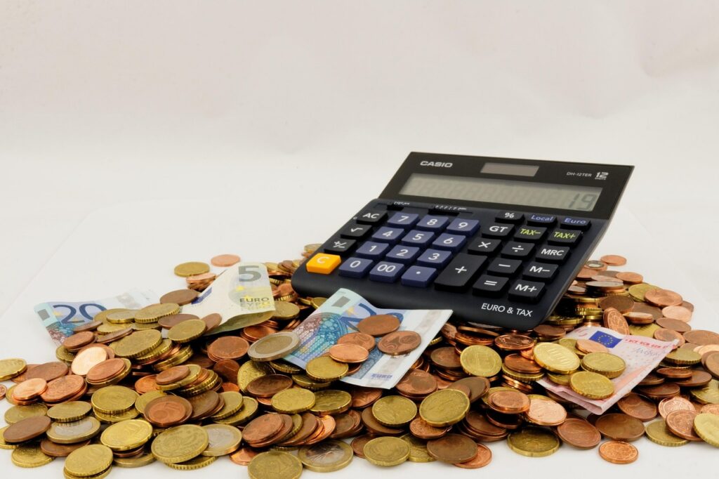 Calculator and bank statement on a small business desk