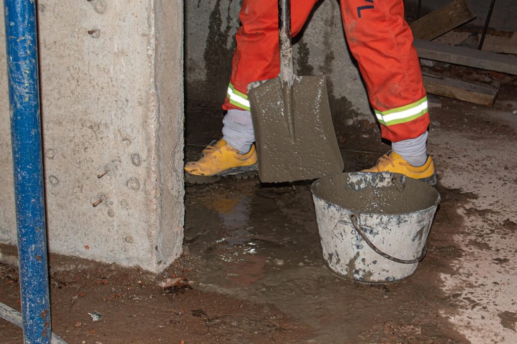 General contractor reviewing invoices and paperwork at a construction jobsite