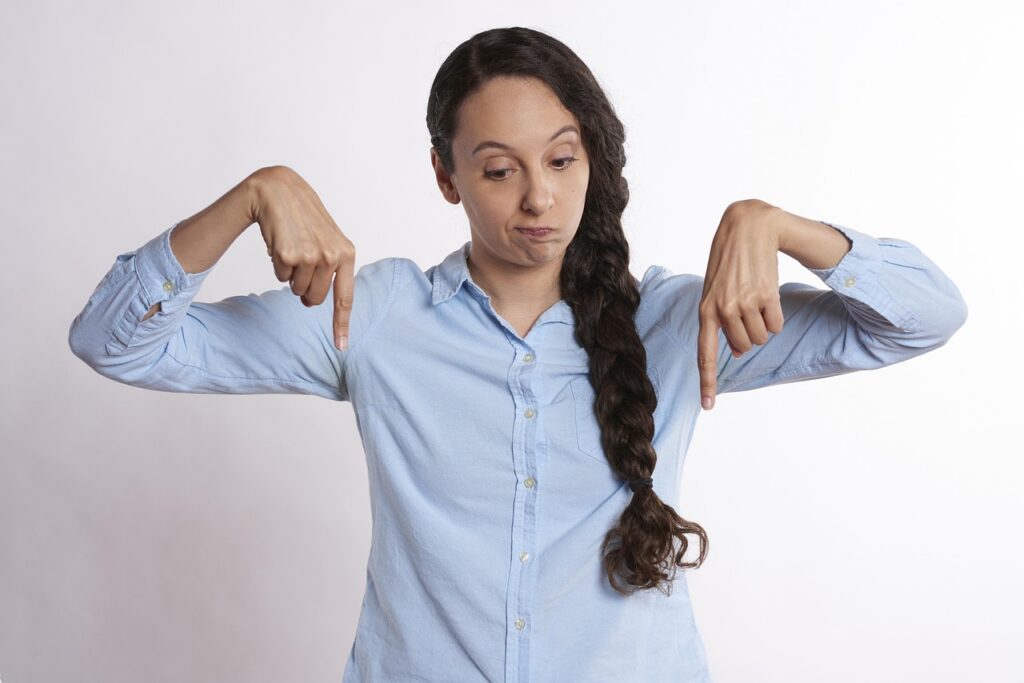 Confident business owner shaking hands after finalizing a debt settlement