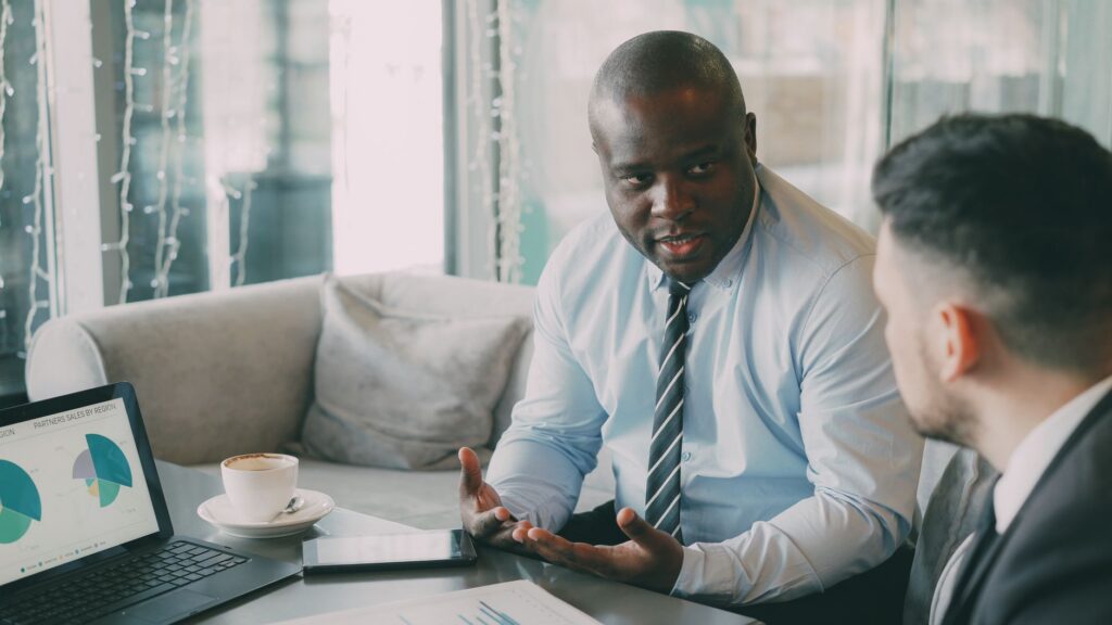 Business owner meeting with a financial advisor in an office