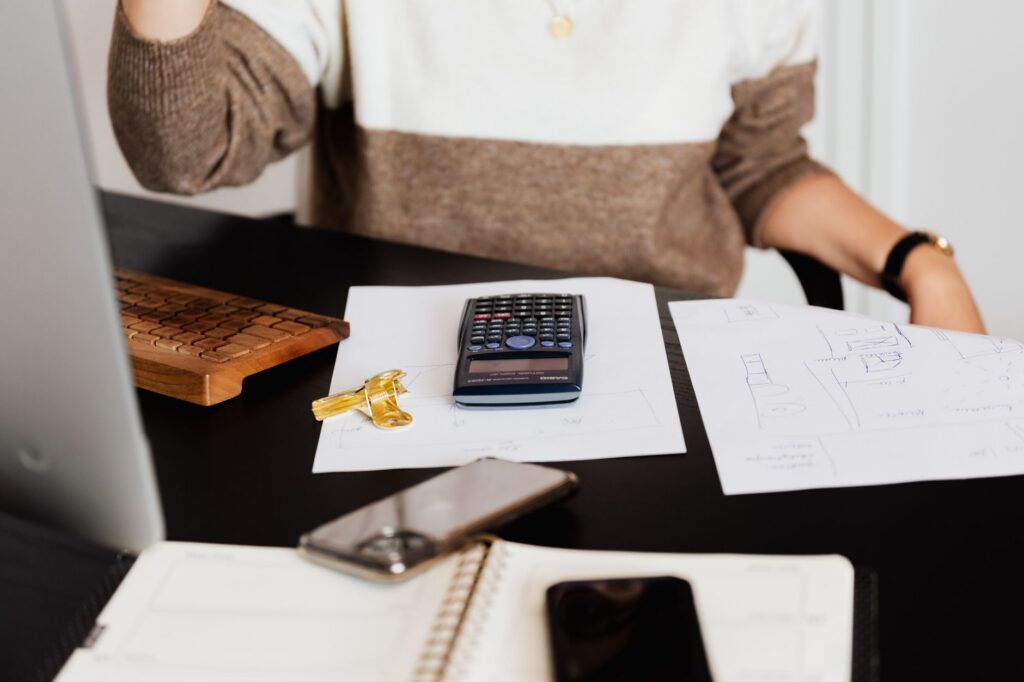 Equipment financing paperwork with a set of truck keys resting on the desk