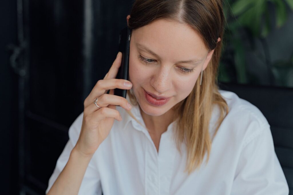 Business owner receiving a phone call about a payoff discount offer