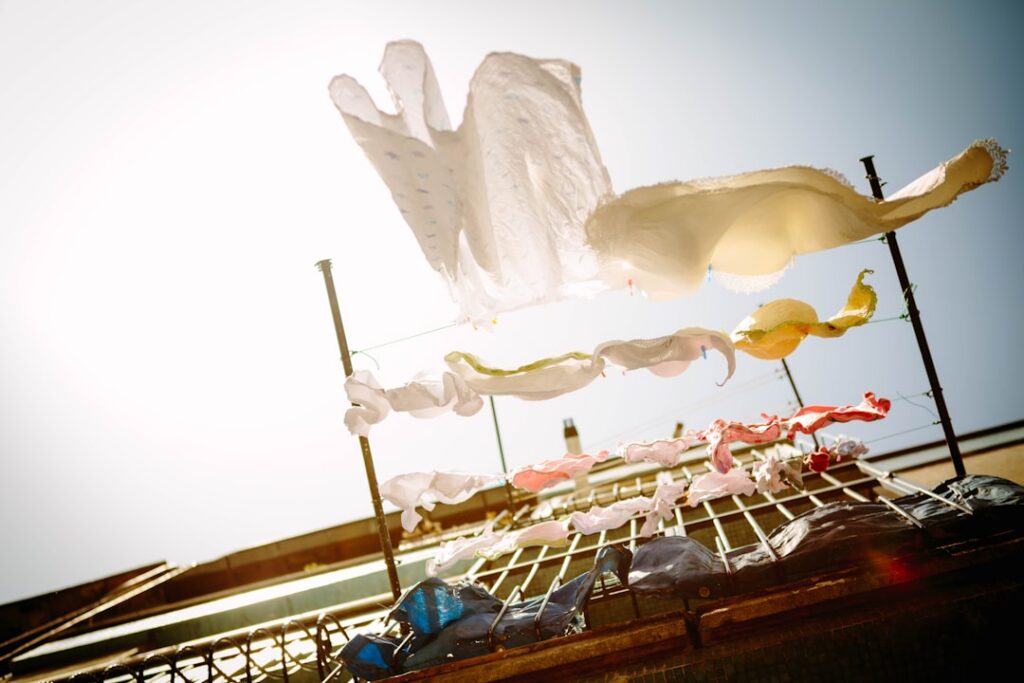 Dry cleaning conveyor rack holding only a few garments during a slow summer day