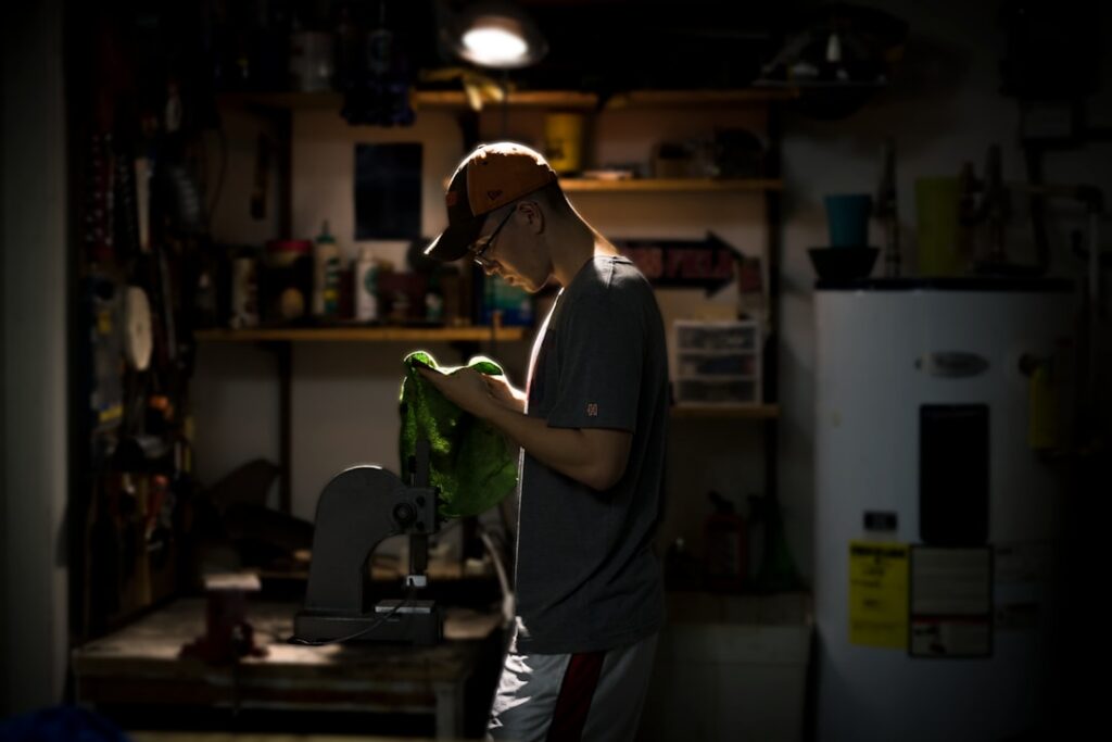HVAC contractor reviewing a fully booked summer service schedule on a tablet
