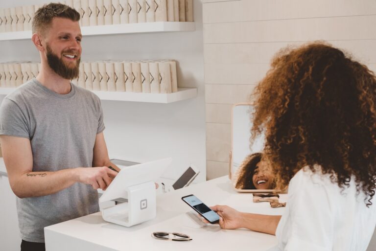 Small business owner talking with a bank representative about their business account