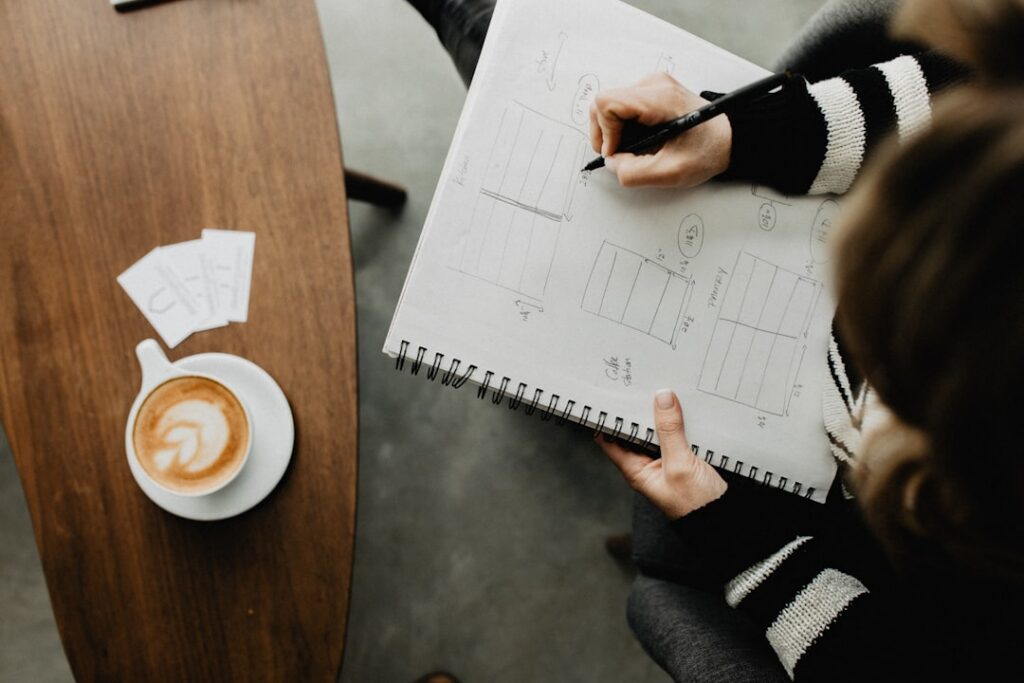 Confident business owner planning ahead using a calendar and notes