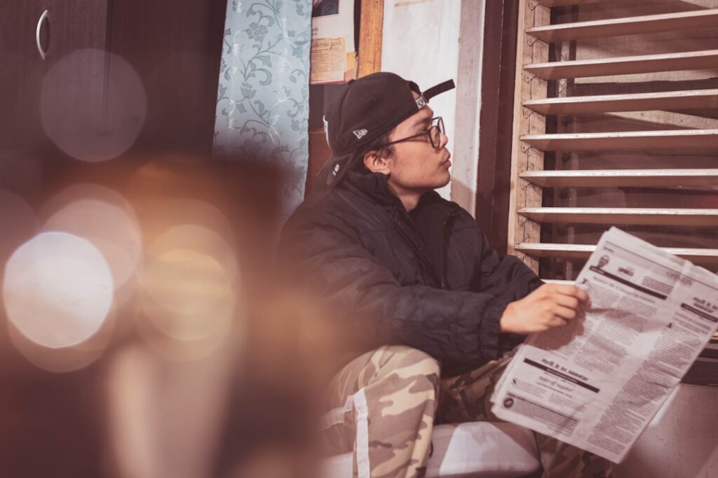 Restaurant owner reviewing receipts and paperwork during a slow shift