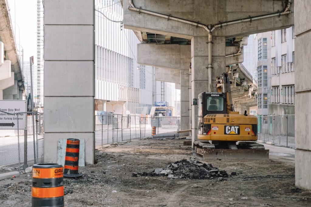 Construction site with an unfinished building and equipment on site