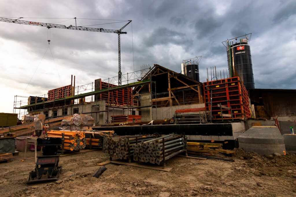 Roofing contractor's truck and equipment parked at a residential job site