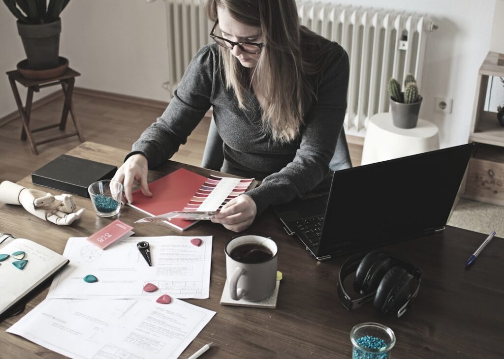 Small business owner reviewing a settlement agreement with a relieved expression