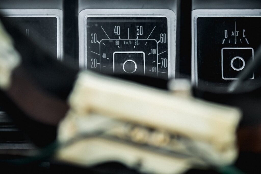 Freight invoice and calculator resting on a truck dashboard