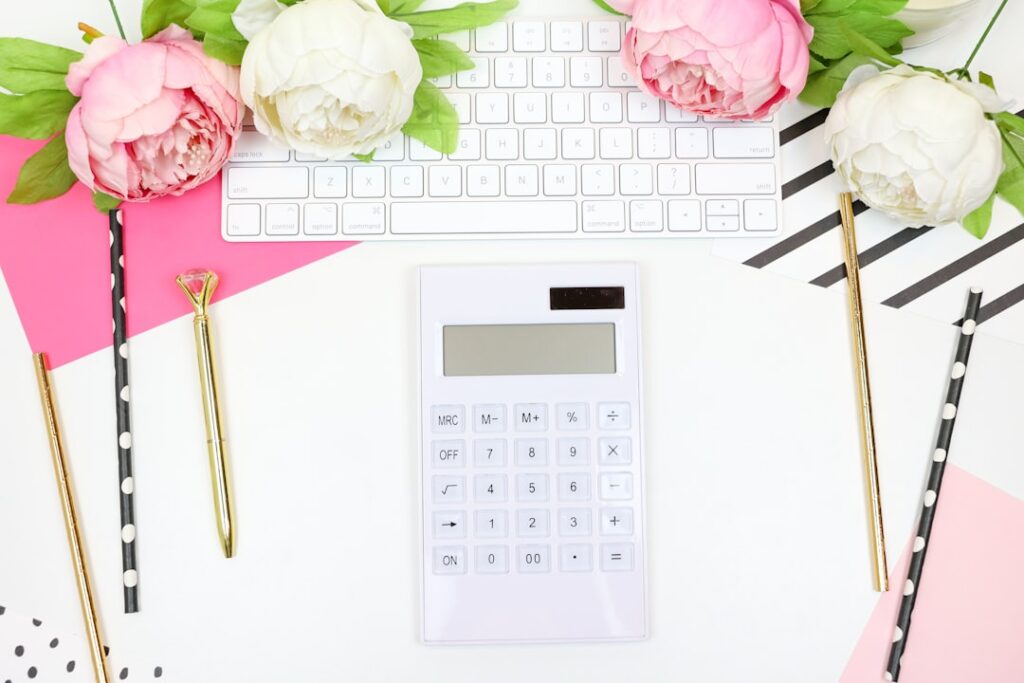 Studio booking calendar and calculator representing peak-season cash planning