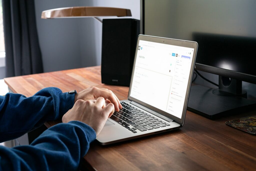 Business owner preparing a formal hardship letter with financial documents for an MCA forbearance request