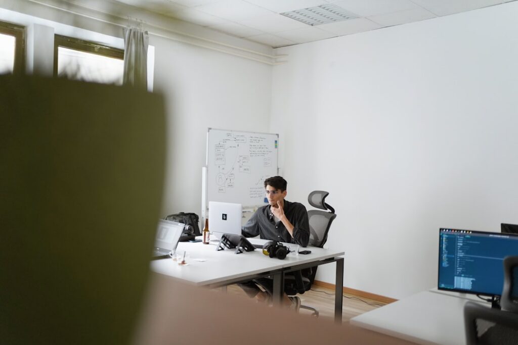 Small business owner making a confident phone call to a debt relief specialist