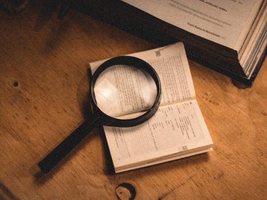 Small business owner examining the fine print of a merchant cash advance contract
