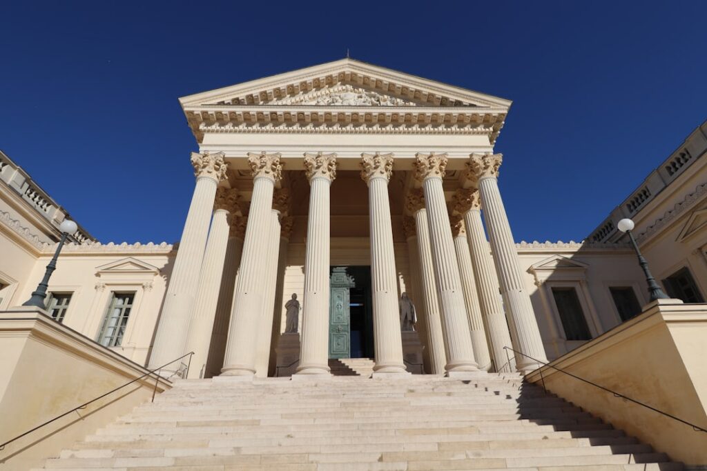 State courthouse exterior representing confession of judgment enforcement